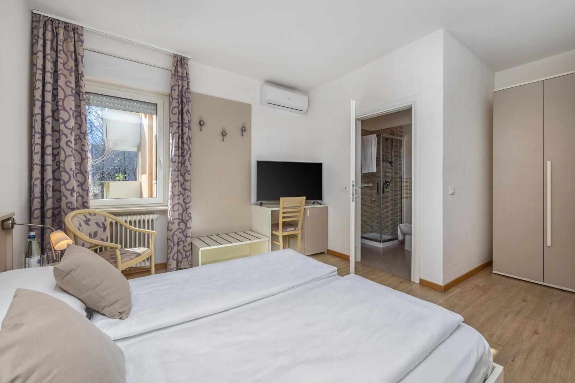 Garden House - Hotel Sport Levico Terme Rum bild